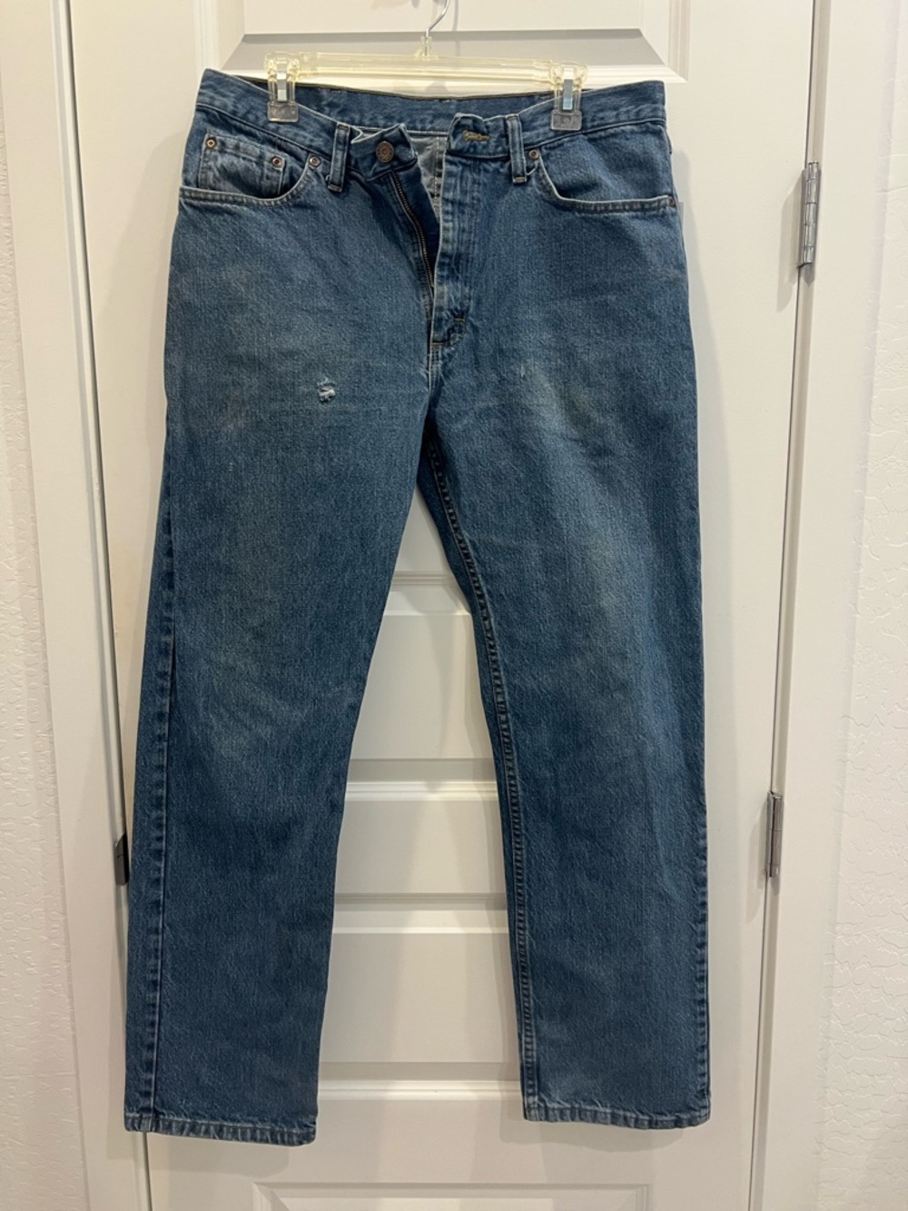 Wrangler Straight Leg Denim Jeans in Medium Blue
